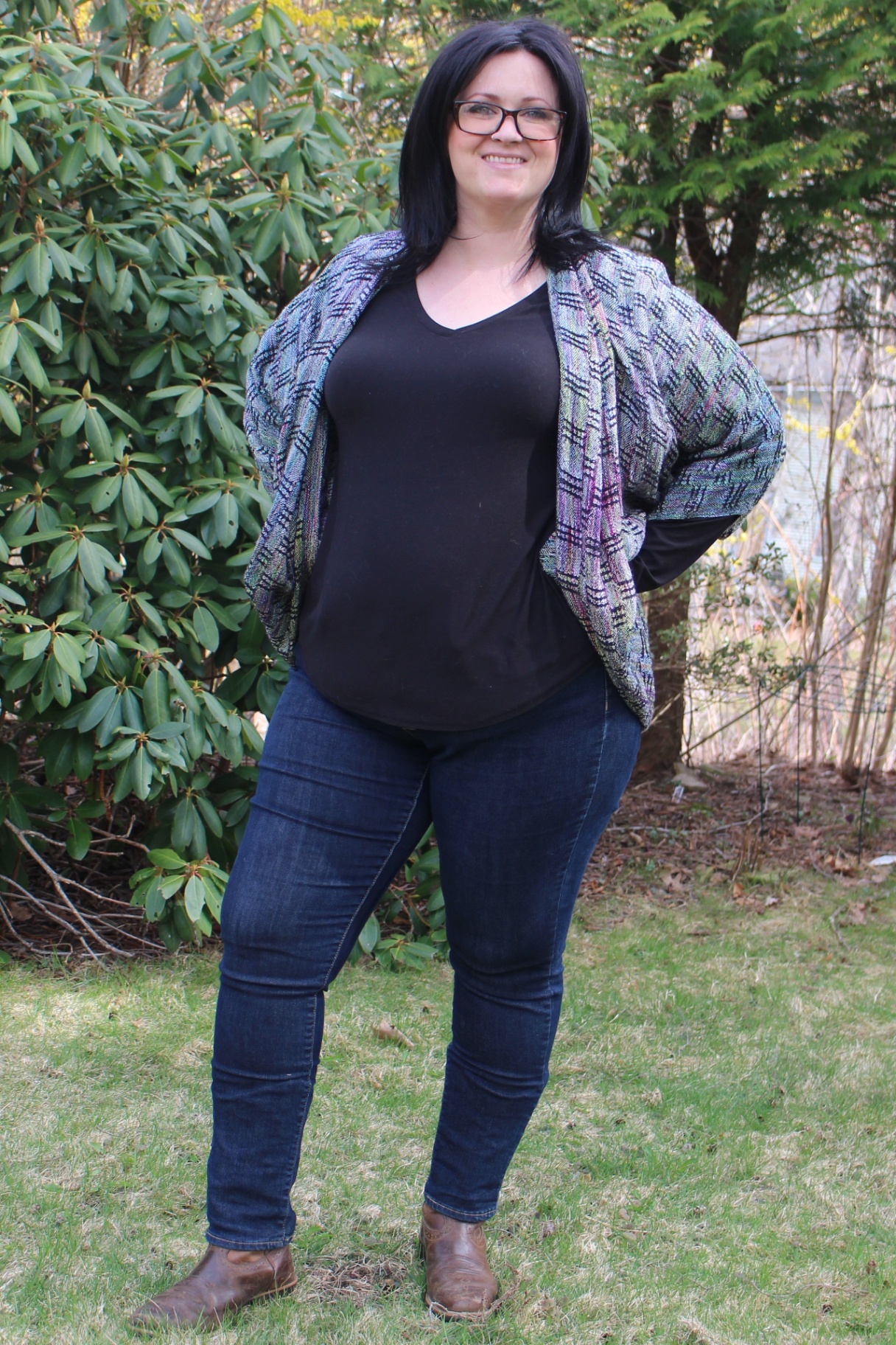Woman wearing a patterned blue and purple cocoon